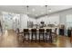 Spacious kitchen with island, stainless steel appliances, and hardwood floors at 31275 Spruceberry Ct, Wesley Chapel, FL 33543
