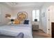 Spacious main bedroom with a large bed and plenty of natural light at 20591 Monza Loop, Land O Lakes, FL 34638