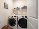 Convenient laundry room with washer and dryer at 20591 Monza Loop, Land O Lakes, FL 34638