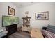 Spacious living room with fireplace and built in shelving at 20591 Monza Loop, Land O Lakes, FL 34638