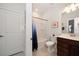 Bathroom with tub, toilet and vanity at 20591 Monza Loop, Land O Lakes, FL 34638