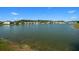 Community lake with fountain and surrounding homes at 20591 Monza Loop, Land O Lakes, FL 34638