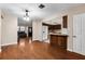 Kitchen with wood cabinets and an adjacent dining area at 1811 Martin Rd, Dover, FL 33527