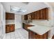 Functional kitchen with wood cabinets and ample counter space at 1811 Martin Rd, Dover, FL 33527
