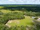 Aerial view of the property showing the home and surrounding land at 1811 Martin Rd, Dover, FL 33527