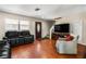 Relaxing living room with hardwood floors and comfy seating at 1811 Martin Rd, Dover, FL 33527