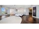 Elegant main bedroom featuring hardwood floors and a comfortable bed at 100 Beach Ne Dr # 1900, St Petersburg, FL 33701