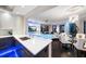 Modern kitchen with breakfast bar and blue underlighting at 100 Beach Ne Dr # 1900, St Petersburg, FL 33701