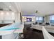 Modern kitchen features a breakfast bar and open living area at 100 Beach Ne Dr # 1900, St Petersburg, FL 33701