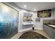 Modern bathroom with a floating vanity, large mirror, and glass doors at 100 Beach Ne Dr # 1900, St Petersburg, FL 33701