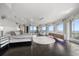 Opulent main bedroom with a canopy bed, hardwood floors and stunning water views at 100 Beach Ne Dr # 1900, St Petersburg, FL 33701