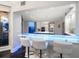 Modern kitchen with breakfast bar and glass countertop at 100 Beach Ne Dr # 1900, St Petersburg, FL 33701