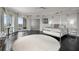 Spacious main bedroom with hardwood floors and a large bed at 100 Beach Ne Dr # 1900, St Petersburg, FL 33701