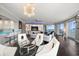 Open concept living room with city views, hardwood floors, and modern furniture at 100 Beach Ne Dr # 1900, St Petersburg, FL 33701