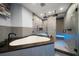 Spa-like bathroom with a free-standing tub and a glass shower at 100 Beach Ne Dr # 1900, St Petersburg, FL 33701