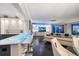 Open concept living room with hardwood floors and city views at 100 Beach Ne Dr # 1900, St Petersburg, FL 33701