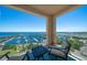Spacious balcony with waterfront views and comfortable seating at 100 Beach Ne Dr # 1900, St Petersburg, FL 33701
