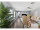 Elegant living room with hardwood floors, stylish furniture, and natural light at 5523 Carlton Rd, New Port Richey, FL 34652