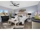 Spacious Primary bedroom with ceiling fan and large bed at 5523 Carlton Rd, New Port Richey, FL 34652