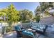 Cozy patio furniture set with wicker chairs and a sofa at 5523 Carlton Rd, New Port Richey, FL 34652