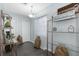 Bright entryway with storage shelves and rustic decor at 5523 Carlton Rd, New Port Richey, FL 34652