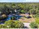 Ranch home nestled amongst mature trees at 5523 Carlton Rd, New Port Richey, FL 34652