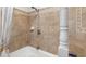 Clean bathroom with tile shower and tub at 5523 Carlton Rd, New Port Richey, FL 34652