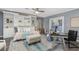 Multi-functional room with built-in shelves, daybed, and workspace at 5523 Carlton Rd, New Port Richey, FL 34652