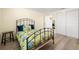 Bright bedroom with a floral comforter and built-in closet at 4239 Tamargo Dr, New Port Richey, FL 34652