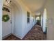 Front entryway with tiled floor and arched doorways leading into the house at 4239 Tamargo Dr, New Port Richey, FL 34652