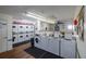 Community laundry room with several washers and dryers at 4239 Tamargo Dr, New Port Richey, FL 34652