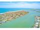 Expansive waterfront view showcasing beach and homes at 736 Island Way # 404, Clearwater Beach, FL 33767
