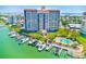 Luxury condo building with private boat slips and pool at 736 Island Way # 404, Clearwater Beach, FL 33767