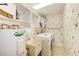 Laundry room with washer, dryer, and utility sink at 736 Island Way # 404, Clearwater Beach, FL 33767
