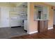 Well-equipped kitchen with white cabinets and tile flooring at 4251 100Th N Ave # 2, Pinellas Park, FL 33782