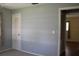 Simple bedroom with closet and access to another room at 4251 100Th N Ave # 2, Pinellas Park, FL 33782