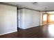 Open living space with wood-look floors and chandelier view at 4251 100Th N Ave # 2, Pinellas Park, FL 33782
