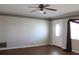 Living room with hardwood floors and front door at 4251 100Th N Ave # 2, Pinellas Park, FL 33782