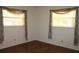 Spacious bedroom with hardwood floors and window coverings at 4251 100Th N Ave # 2, Pinellas Park, FL 33782