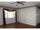 Living room with laminate flooring and decorative border at 4251 100Th N Ave # 2, Pinellas Park, FL 33782