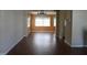 Bright dining room features a chandelier and laminate wood flooring at 4251 100Th N Ave # 2, Pinellas Park, FL 33782