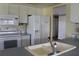 Kitchen boasts white appliances, ample counter space, and a double sink at 4251 100Th N Ave # 2, Pinellas Park, FL 33782