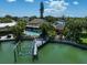 Property's waterfront location with a pool and dock at 309 Belle Isle Ave, Belleair Beach, FL 33786