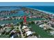 Bird's-eye view of property near waterway at 309 Belle Isle Ave, Belleair Beach, FL 33786