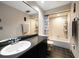 Clean bathroom with a shower/tub combo at 309 Belle Isle Ave, Belleair Beach, FL 33786