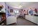 Bedroom with a white bed frame and a desk at 309 Belle Isle Ave, Belleair Beach, FL 33786