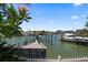Private dock with access to the waterway at 309 Belle Isle Ave, Belleair Beach, FL 33786
