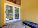 Front door featuring decorative glass and welcoming mat at 309 Belle Isle Ave, Belleair Beach, FL 33786