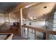 Upstairs game room with pool table and seating area at 309 Belle Isle Ave, Belleair Beach, FL 33786