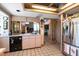 Kitchen with stainless steel appliances and breakfast bar at 309 Belle Isle Ave, Belleair Beach, FL 33786